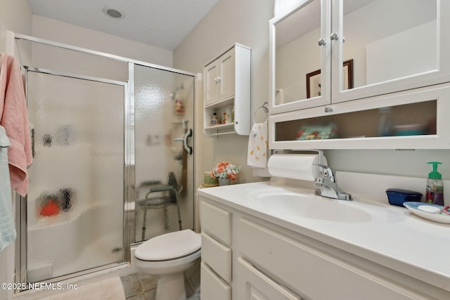 37069 Lee St, Hilliard, FL 32046 - bathroom featuring vanity, toilet, and an enclosed shower