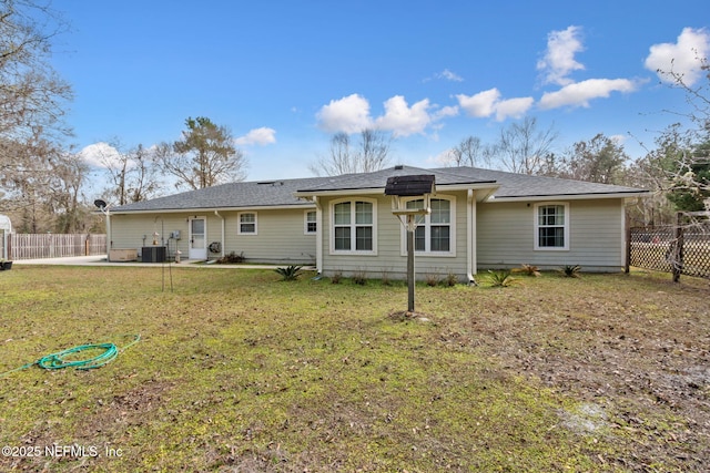 37069 Lee St, Hilliard, FL 32046 - rear view of property with cooling unit and a lawn