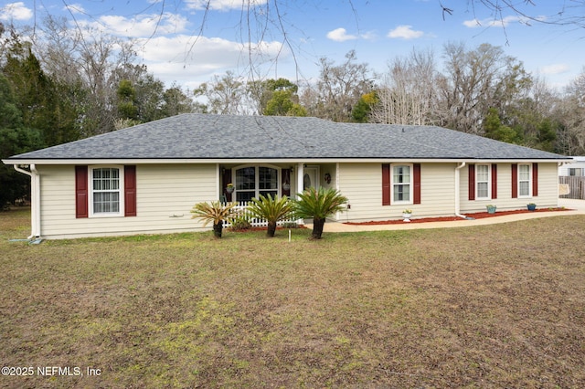 ranch-style house featuring a front lawn