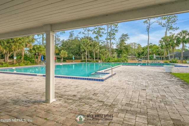 pool featuring a patio area