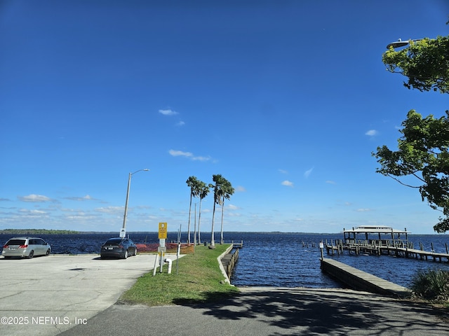 view of dock with a water view