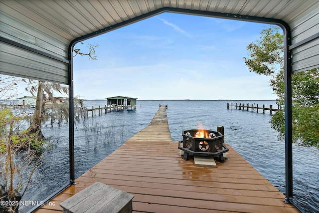 dock area with a water view