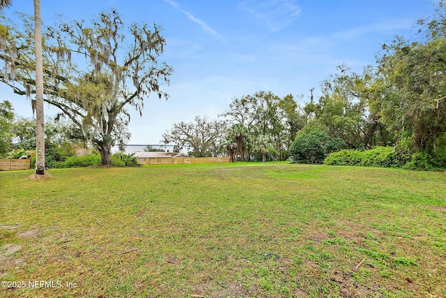 view of yard with fence