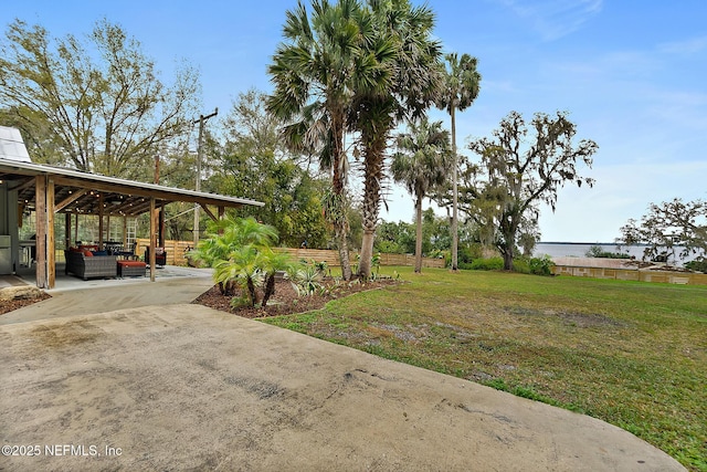 view of yard with a patio and an outdoor living space