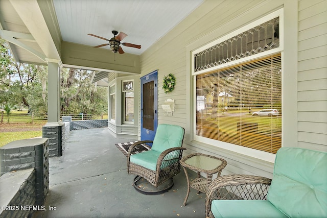 view of patio / terrace with a porch and a ceiling fan