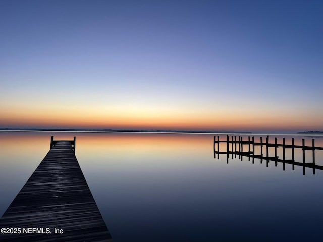 view of dock with a water view