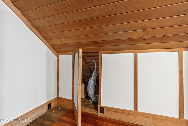 interior space with lofted ceiling, wooden ceiling, and wood finished floors