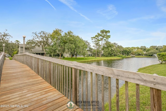 deck featuring a water view