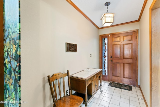 foyer entrance featuring light tile patterned floors, baseboards, and crown molding