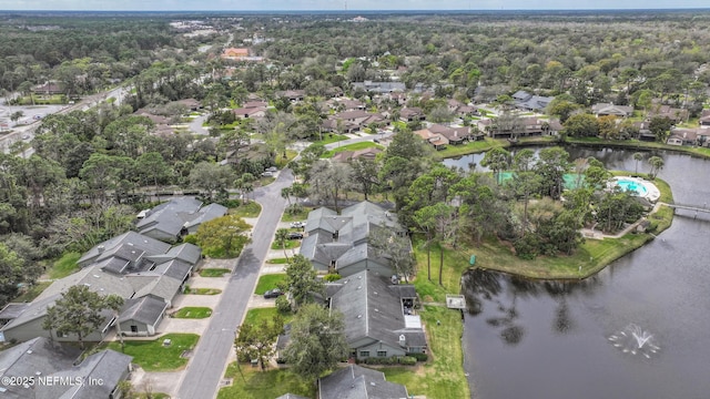 birds eye view of property featuring a residential view and a water view