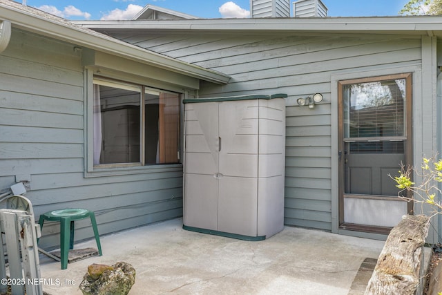 doorway to property with a patio