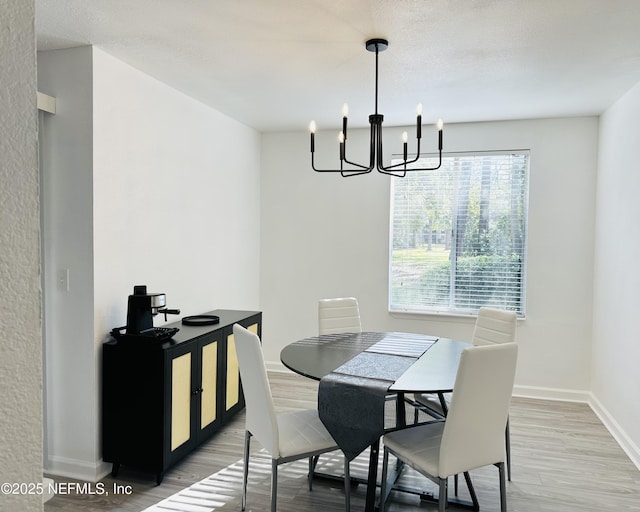 8880 S Old Kings Rd Unit 5, Jacksonville, FL 32257 - dining area with hardwood / wood-style floors and a chandelier