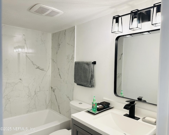 8880 S Old Kings Rd Unit 5, Jacksonville, FL 32257 - full bathroom featuring vanity, tiled shower / bath combo, a textured ceiling, and toilet