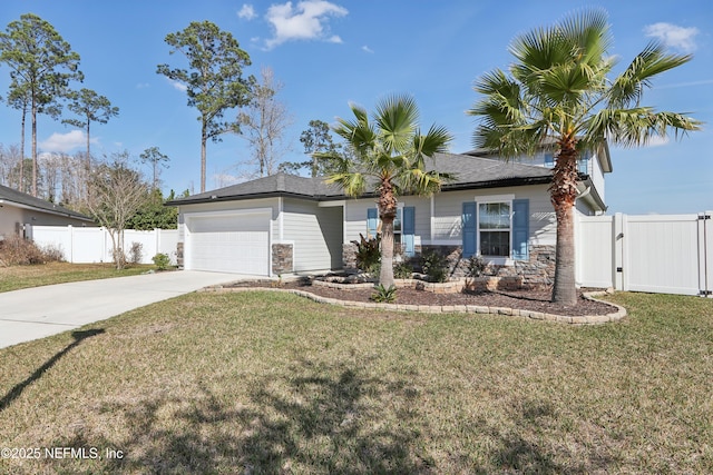 view of front facade featuring a garage and a front yard