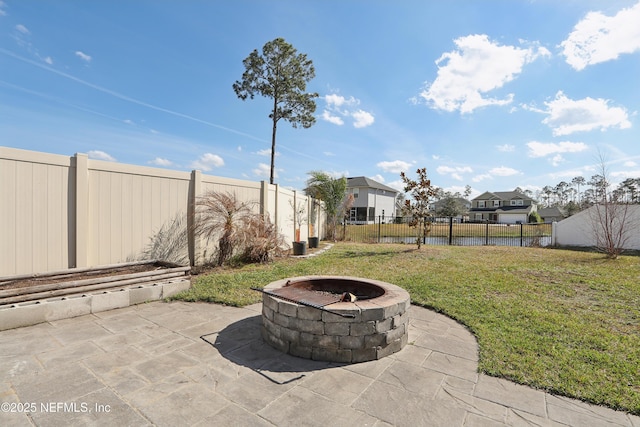 view of patio featuring a fire pit