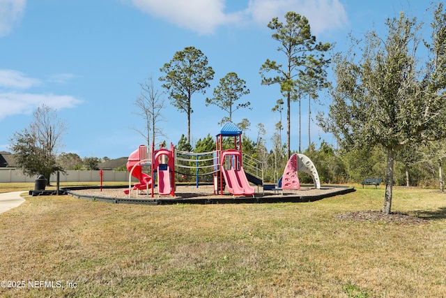 view of playground featuring a lawn