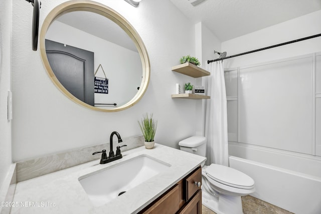 full bathroom featuring vanity, shower / bath combination with curtain, a textured ceiling, and toilet