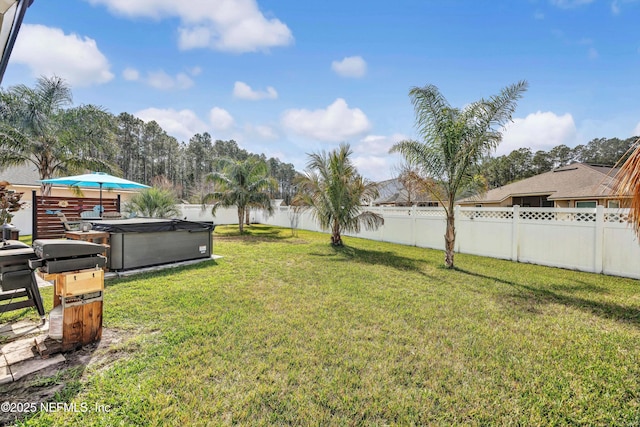 view of yard featuring a hot tub