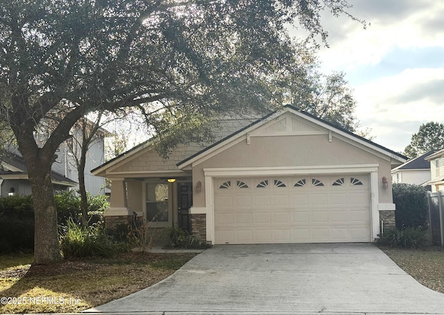 view of front of property featuring a garage