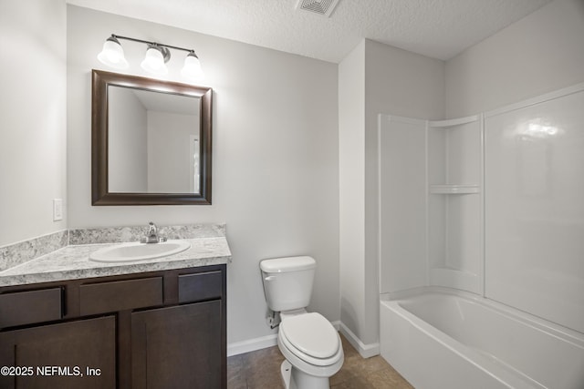 bathroom with visible vents, toilet, a textured ceiling, vanity, and baseboards