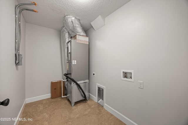 laundry room featuring a textured ceiling, laundry area, washer hookup, baseboards, and electric dryer hookup