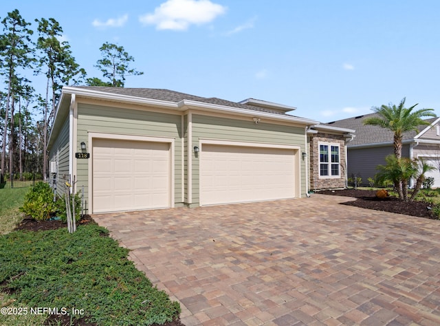 view of front of home with a garage