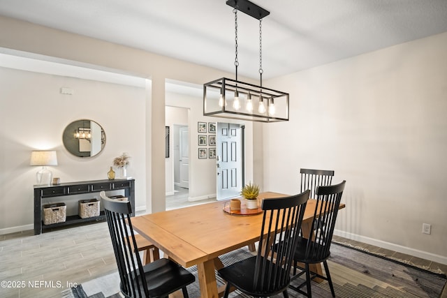 dining room with light hardwood / wood-style floors