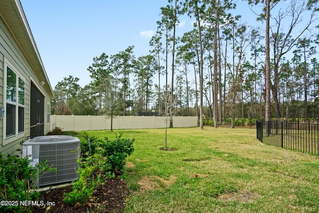 view of yard featuring central AC