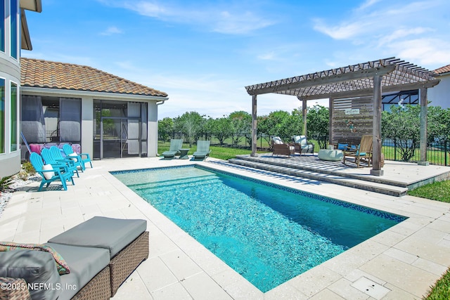 view of swimming pool featuring a patio and a pergola