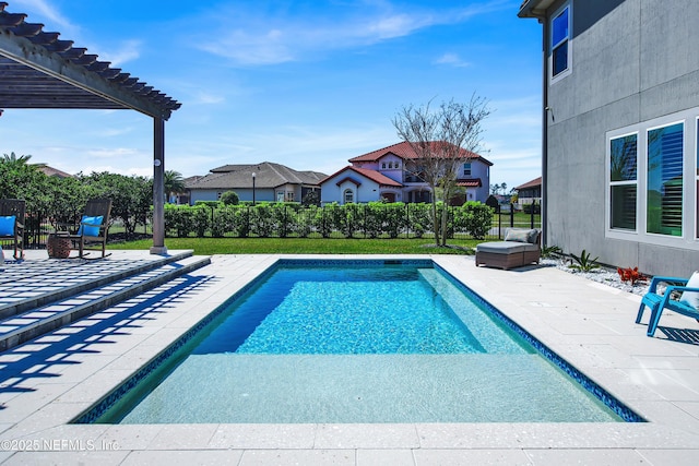 view of swimming pool with a patio, a jacuzzi, and a pergola