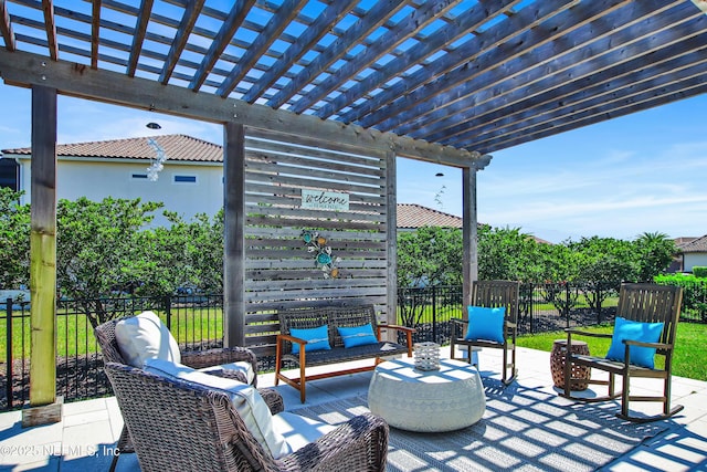 view of patio / terrace featuring an outdoor living space and a pergola