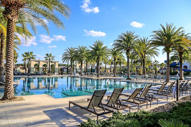 view of swimming pool featuring a patio area