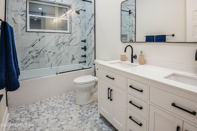 full bathroom with toilet, vanity, and shower / bath combination with glass door