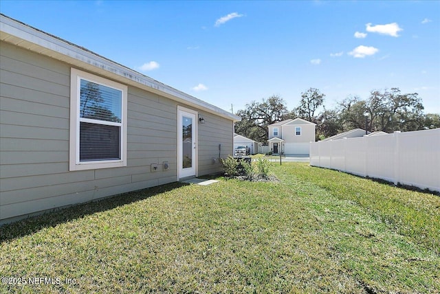 view of yard featuring fence