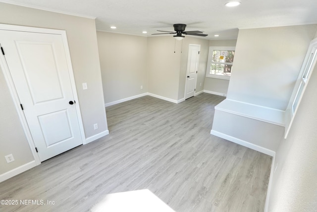 unfurnished room with a ceiling fan, light wood-type flooring, baseboards, and recessed lighting