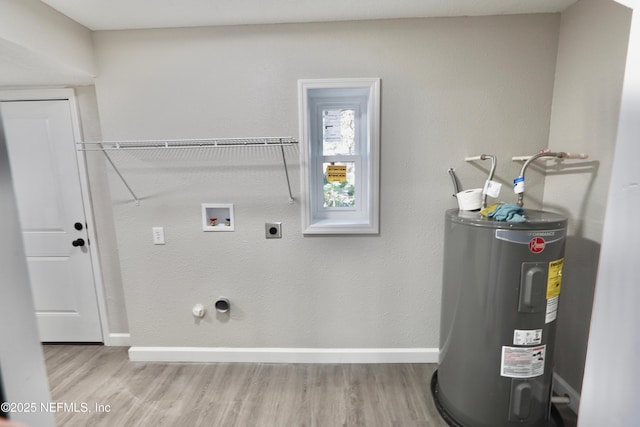 laundry room with hookup for a washing machine, laundry area, water heater, and light wood finished floors