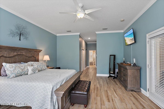 bedroom with light wood-type flooring, a closet, a textured ceiling, and baseboards