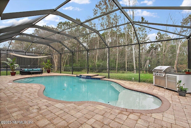 pool featuring glass enclosure, a patio, and area for grilling