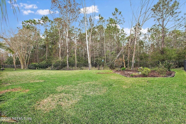 view of yard featuring fence