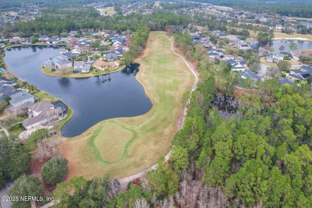 birds eye view of property featuring a water view, view of golf course, and a residential view