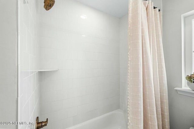 full bath with shower / bath combination with curtain