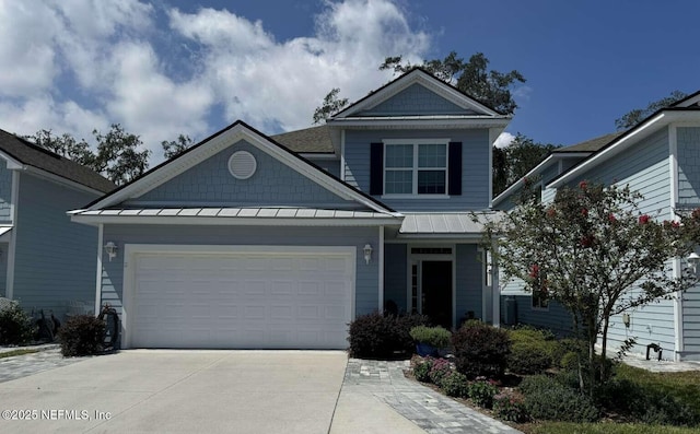 view of front of property featuring a garage