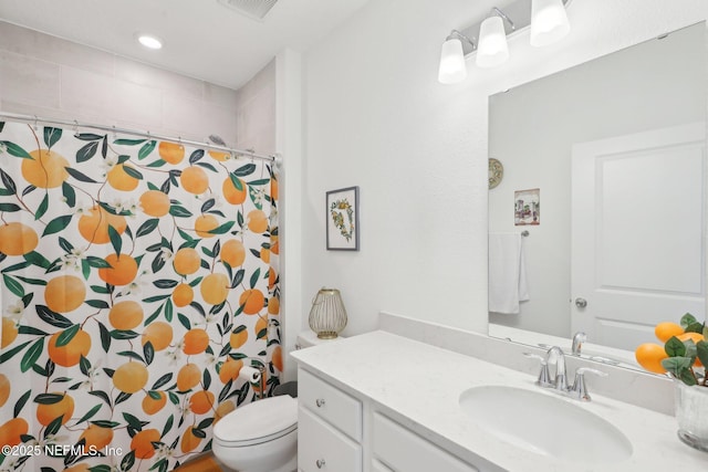 bathroom with visible vents, curtained shower, toilet, and vanity