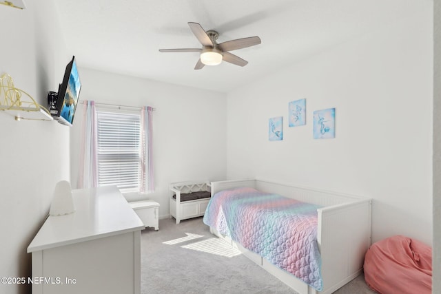 bedroom with light colored carpet and ceiling fan