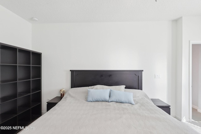 bedroom with a textured ceiling