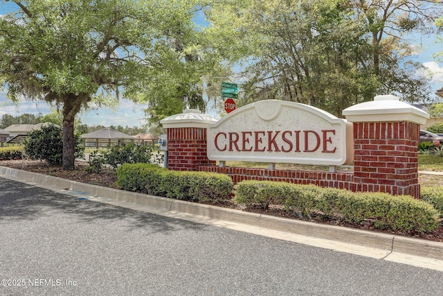 view of community sign