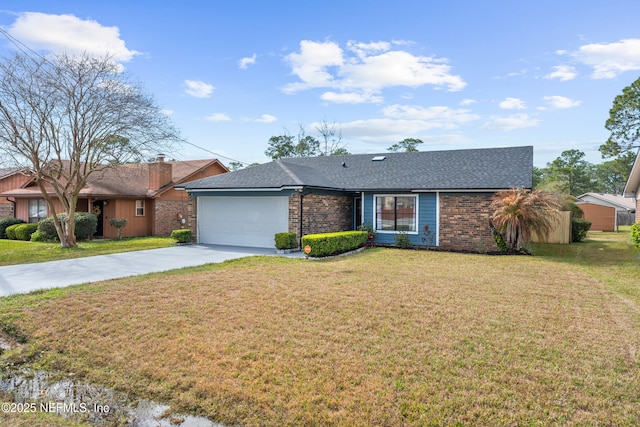 single story home with an attached garage, driveway, brick siding, and a front yard