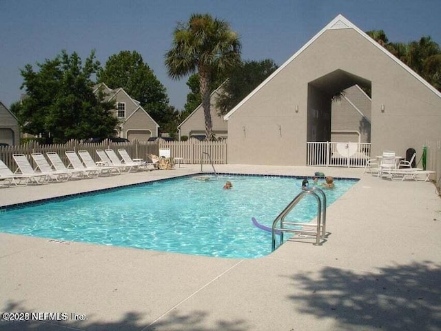 view of pool featuring a patio area