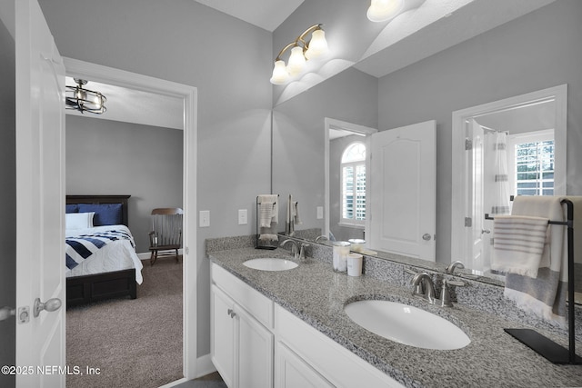 bathroom with a wealth of natural light and vanity