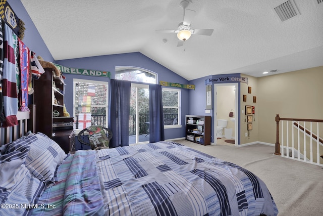 carpeted bedroom featuring a textured ceiling, a ceiling fan, visible vents, vaulted ceiling, and baseboards